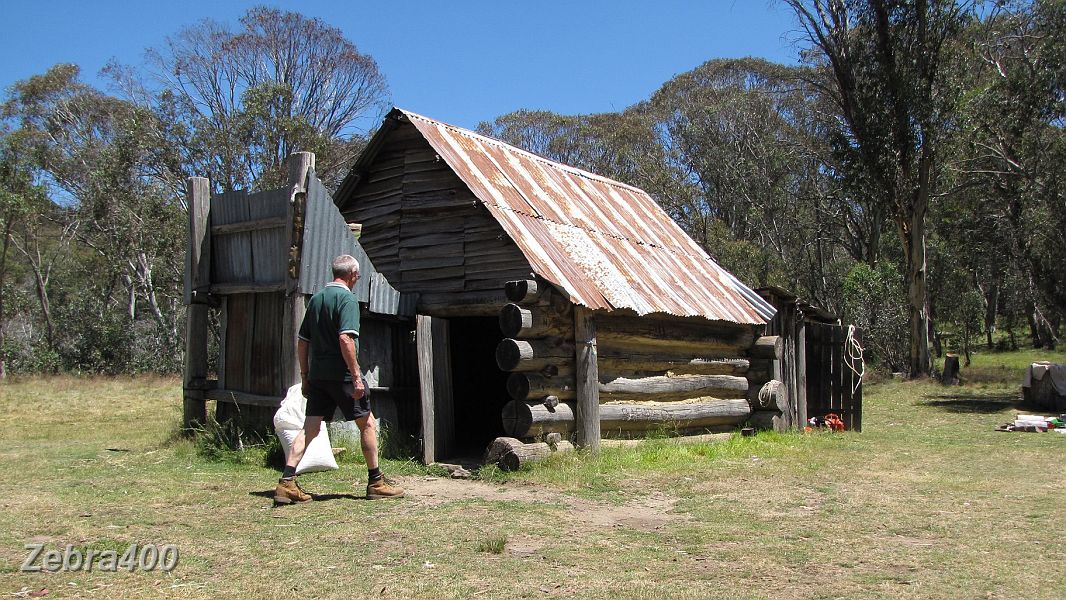 34-Duncan checks out the well maintained Davies Hut.JPG - 34-Duncan checks out the well maintained Davies Hut